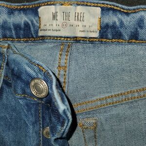 Free People High Rise distressed skinny jeans